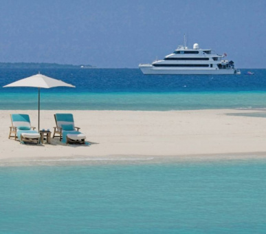 Фото Four Seasons Resort Maldives At Kuda Huraa (, Мальдивские острова) 2